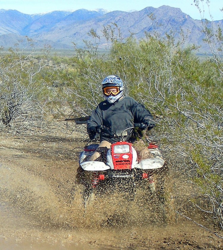 Norm doing what she loves to do after it rains in the desert.
