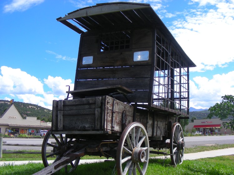 I like this shot of the paddy wagon. there are two plaques on the front that make it look like a character from the "Cars" movies...