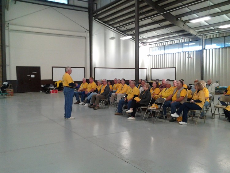 The gang is all here for some singing and some words from the Lord. What you have here is a church service...