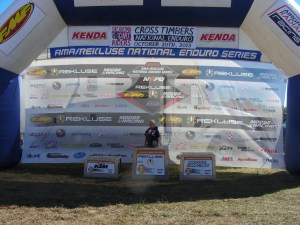 Leo practices posing for photos on the number 1 spot of the podium...