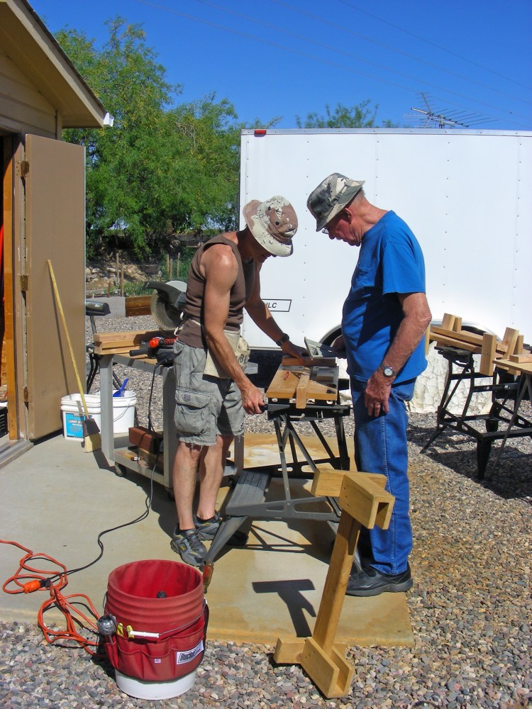 Paul is trying real hard to keep me from messing up another piece of wood...
